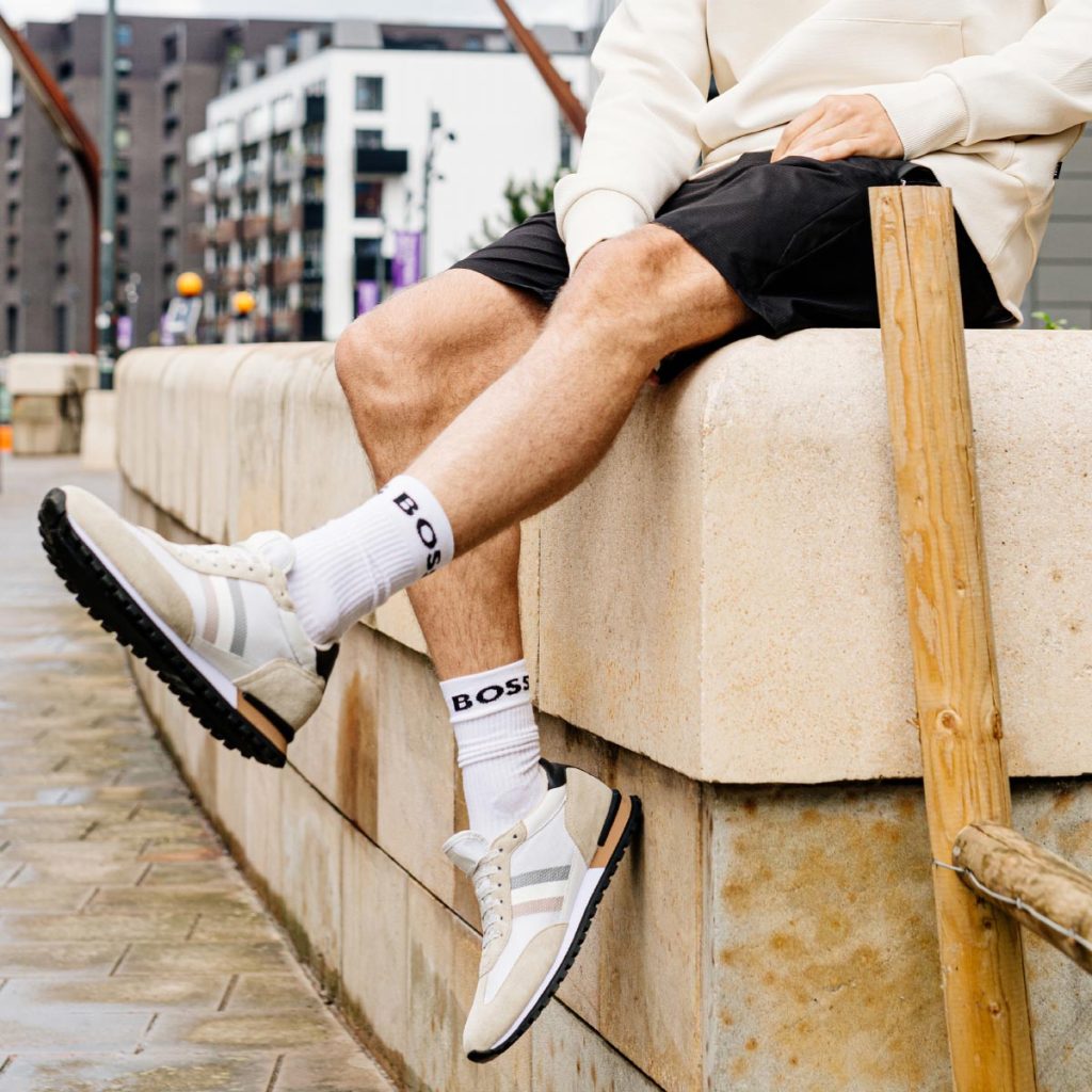 Kicking back in shorts and trainers