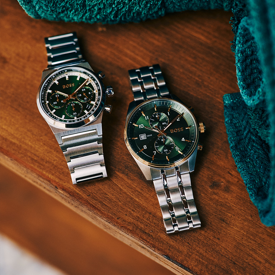 A pair of watches on a table